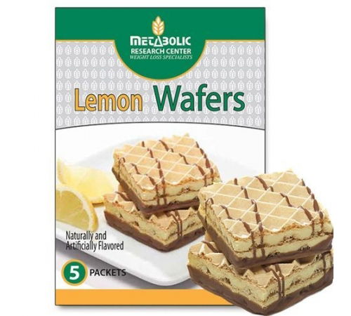 A box of lemon protein wafer bars with two wafers stacked up